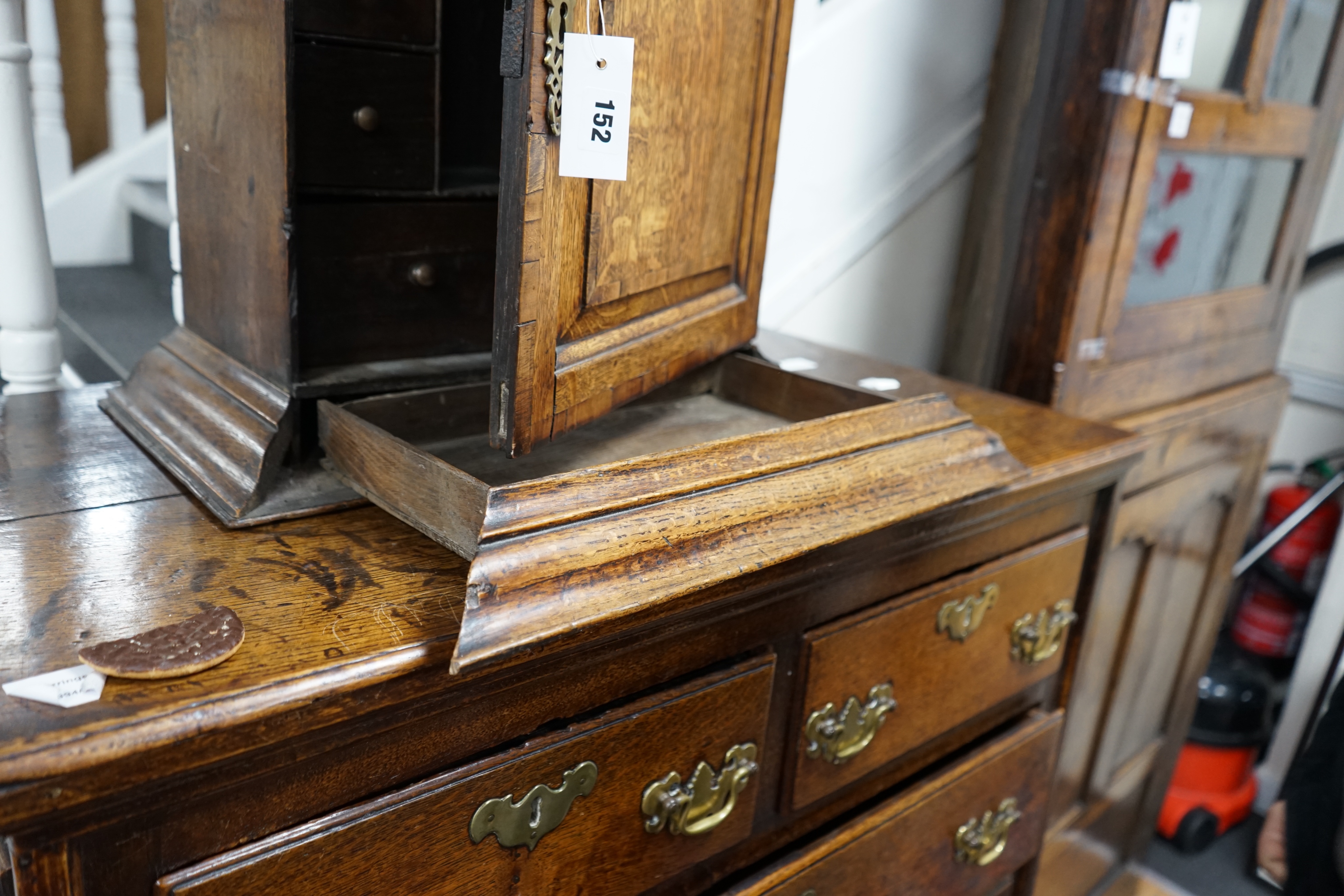 A18th century banded oak spice cupboard, with concealed drawer, width 53cm depth 29cm height 57cm